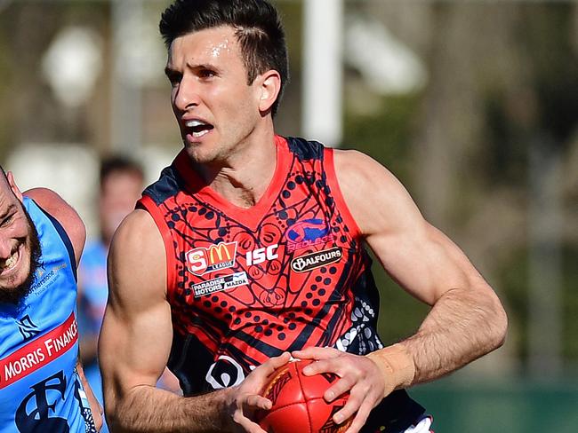 14/07/18 - SANFL: Sturt v Norwood at Unley Oval.  Sturt's Zane Kirkwood chases Norwood's Matthew Panos.Picture: Tom Huntley