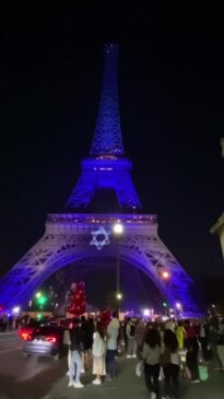 Eiffel Tower Glows Blue and White in Support of Israel