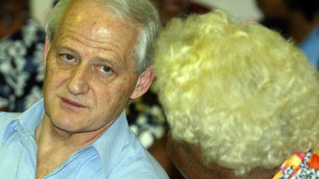 Indigenous affairs minister Philip Ruddock speaks to elders at Napranum Aboriginal Community, near Weipa, in 2003. Picture: Bruce Long