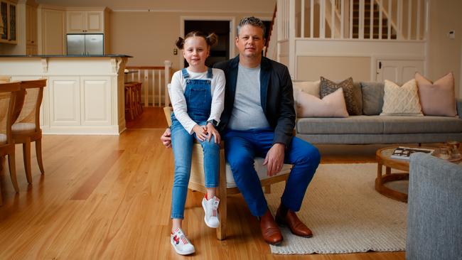 Roy Fischer and his daughter Claudia at their home, 4 Giles Ave in Glenelg. Pic: Matt Turner.