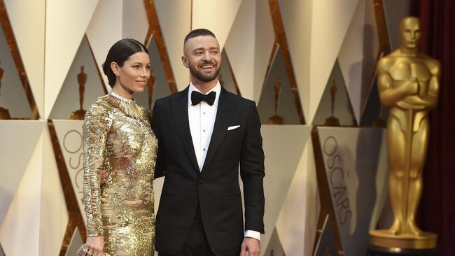 Straight tux for Justin Timberlake, with partner Jessica Biel. JT describes her dress as ‘perfection’. Picture: AP