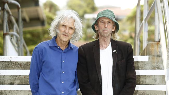 Peter O'Doherty and Reg Mombassa from Dog trumpet were prepared to support the concert at Brookvale Oval before the storms on Sunday. Picture: John Appleyard