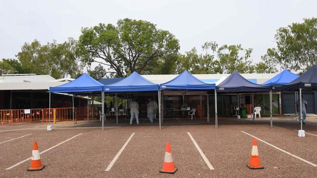 Staff rotate in 30 minute shifts at Katherine East testing clinic as temperatures and humidity climb. Picture: Amanda Parkinson