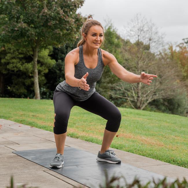 Celebrity trainer Michelle Bridgesdoes her squats.