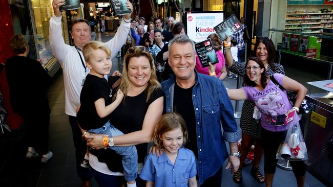 Jimmy Barnes with fans Melissa Northwood, Jesse and Jai at Dymocks Rouse Hill.