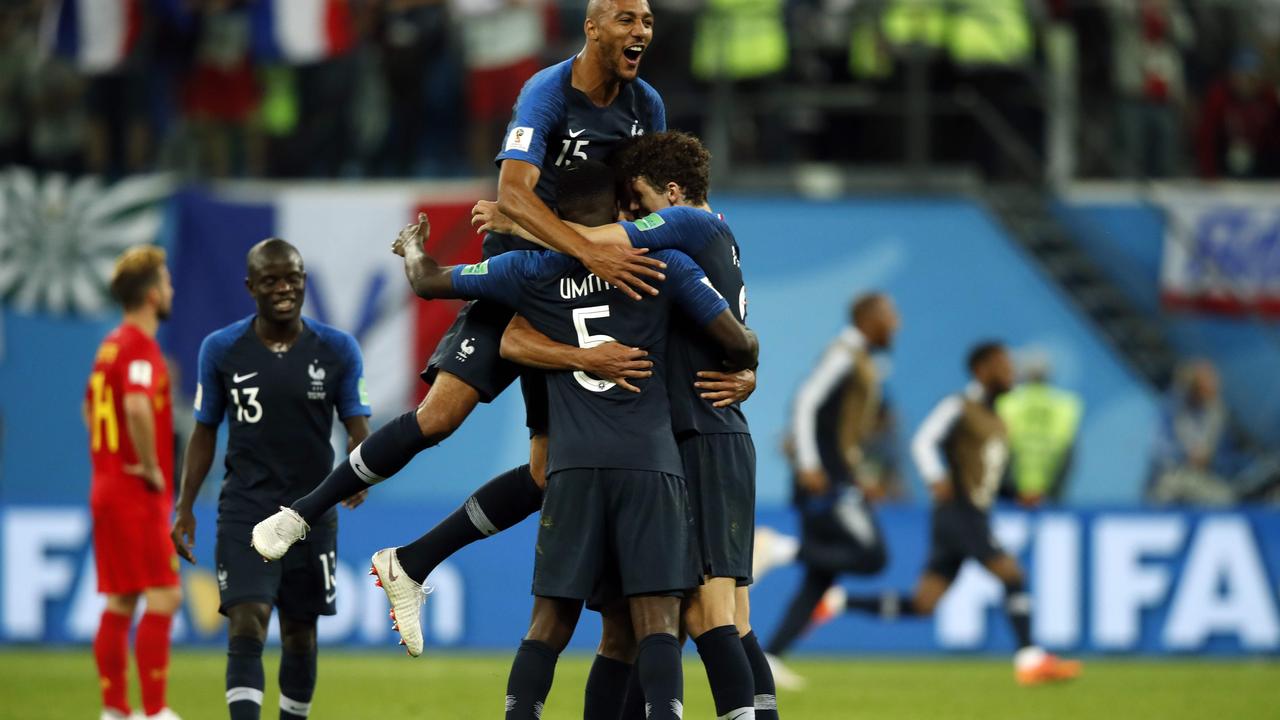 Through to the final! France’s players celebrate their victory over Belgium in the World Cup semi final.