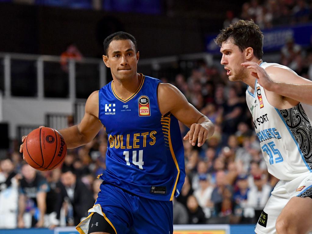 Mika Vukona (left) of the Bullets takes on Robert Loe (right) of the Breakers during the Round 19 NBL match between the Brisbane Bullets and the New Zealand Breakers at Nissan Arena in Brisbane, Friday, February 7, 2020. (AAP Image/Darren England) NO ARCHIVING