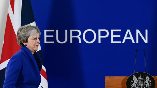 Britain's Prime Minister Theresa May gives a press conference after the European Council vote to endorse the draft Brexit withdrawal agreement.