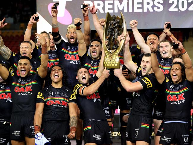 Nathan Cleary, Isaah Yeo and the Panthers celebrate winning the 2021 NRL Grand Final between the Penrith Panthers and Souths Sydney Rabbitohs at Suncorp Stadium in Brisbane. Picture: Adam Head