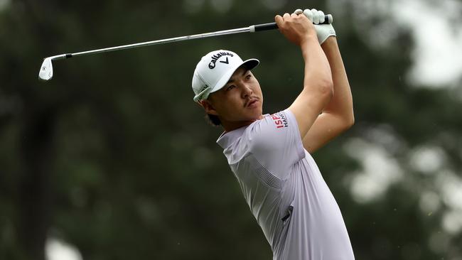 Min Woo Lee plays a shot during the opening round of the 2023 Masters. Picture: Getty Images