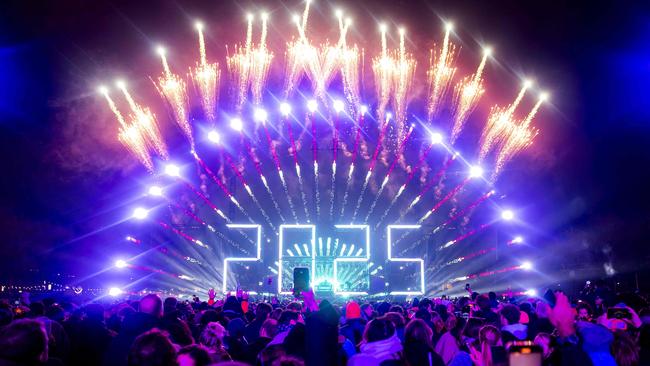 Revellers celebrate the new year at the Museumplein during the fireworks and electronic light show in Amsterdam. Picture: AFP