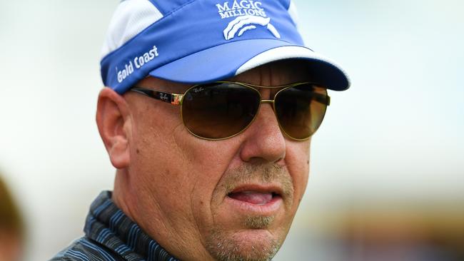 Darryl Hansen, trainer of Bat a Kat, is seen during the Twilight Races at the Doomben Racecourse, Brisbane, Friday, December 8, 2017. (AAP Image/Albert Perez) NO ARCHIVING, EDITORIAL USE ONLY