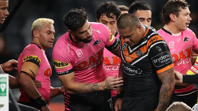 James Tamou tries — and fails — to calm Joey Leilua after his brother Luciano was accidentally injured. Picture: Mark Kolbe/Getty Images