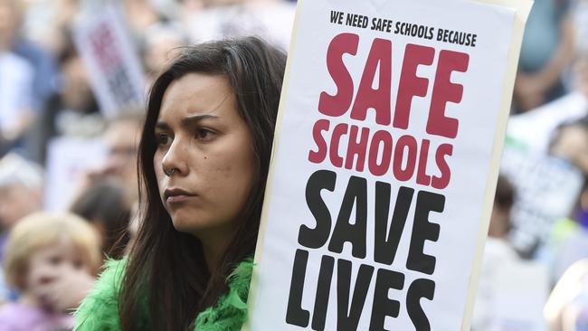 Thousands of Melbournians rallied outside the State Library in Melbourne to support the LGBTI student program. Monday, March. 21, 2016. (AAP Image/Mal Fairclough) NO ARCHIVING