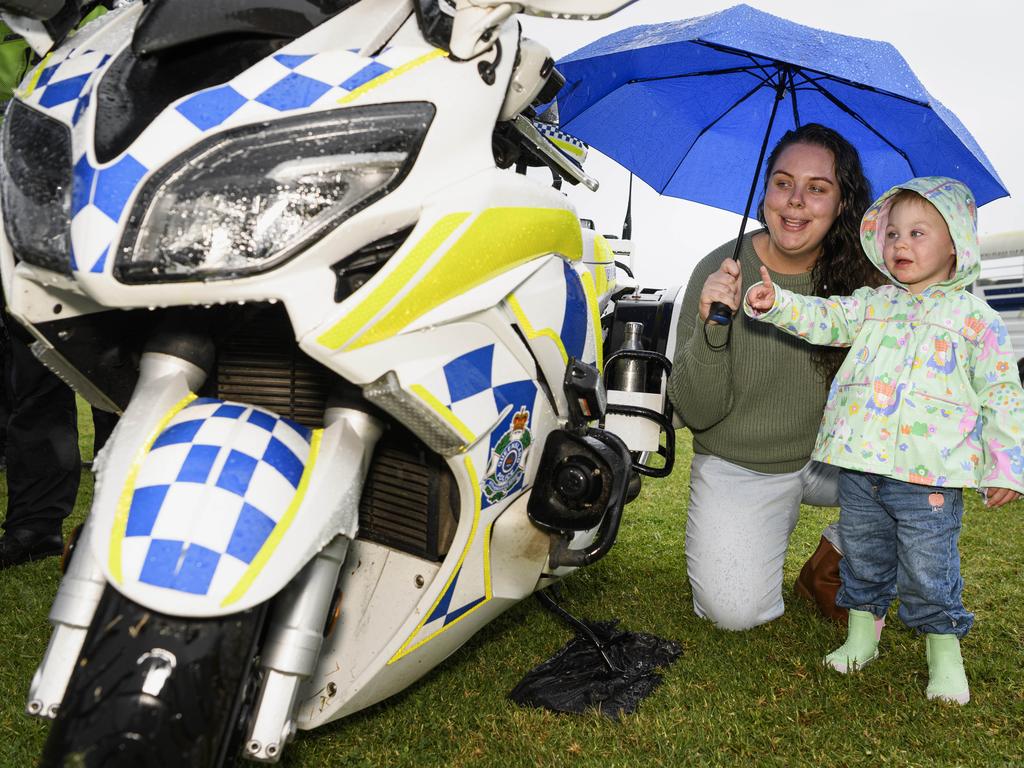 Emily Balch with her daughter Isla Blackwell at the Queensland Police Community Safety and Career Expo on the TAFE oval, Saturday, May 31, 2025. Picture: Kevin Farmer