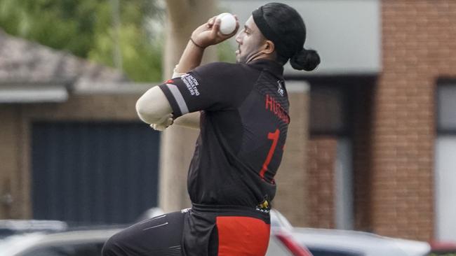 Musa Hussain bowling for Essendon. Picture: Valeriu Campan