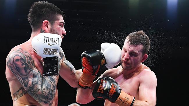 Michael Zerafa lands a left hook on Jeff Horn during their Australian middleweight bout in Bendigo. Picture: Getty Images