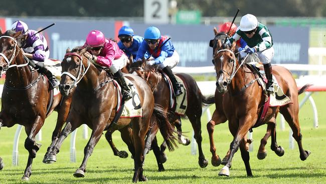 SYDNEY, AUSTRALIA - FEBRUARY 15: Jason Collett riding Fangirl win Race 8 Apollo Stakes during Sydney Racing at Royal Randwick Racecourse on February 15, 2025 in Sydney, Australia. (Photo by Jeremy Ng/Getty Images)