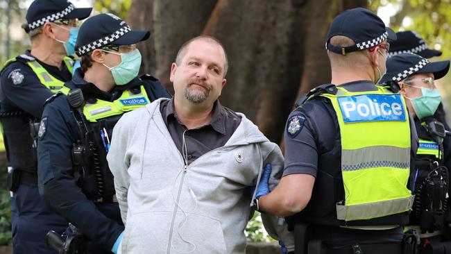 Police handcuffed and pepper sprayed several people at an anti-lockdown protest in Melbourne on Saturday. Picture: Alex Coppel.