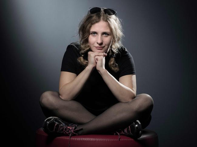 Pussy Riot member Maria Alyokhina has left Russia, she said in an interview, after disguising herself as a food delivery courier to escape.