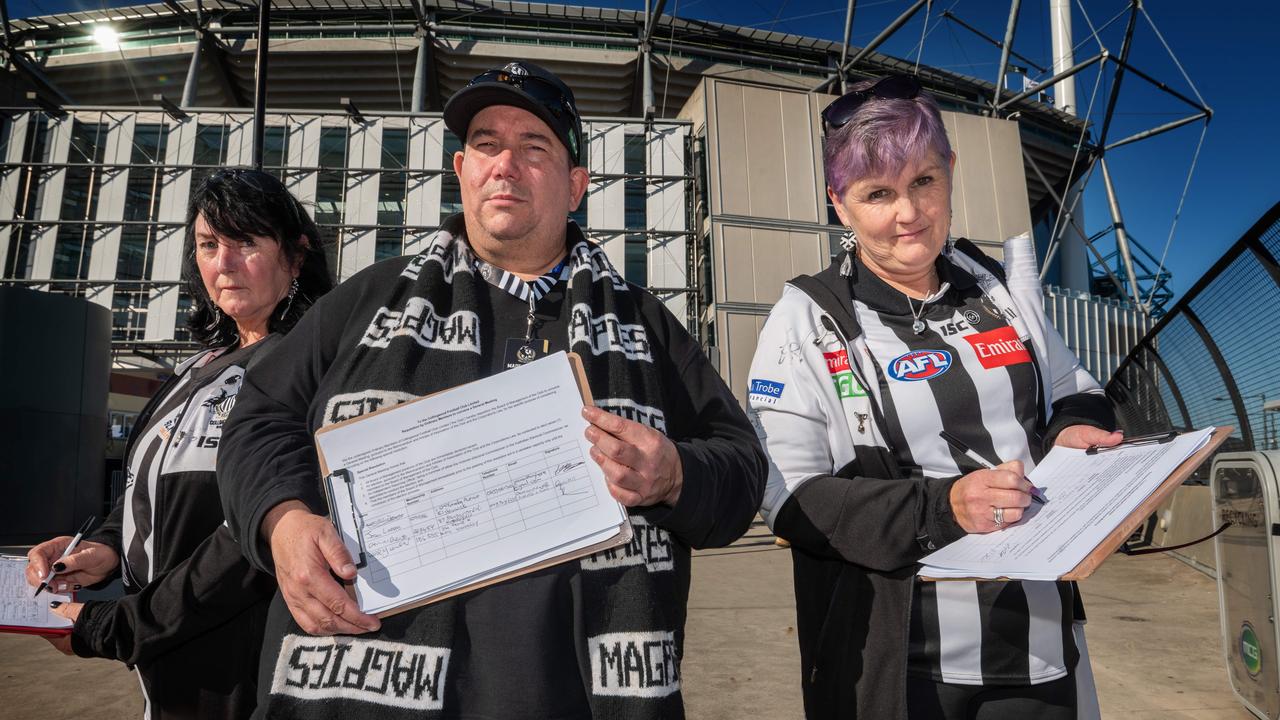 Pies fans are agitating to overthrow the board. Members signing petition floating Before the Magpies and Port Adelaide game at MCG Petition organiser David Hatley (40 year Collingwood member), with members Colleen Riding and Maxine Willis. Picture: Tony Gough