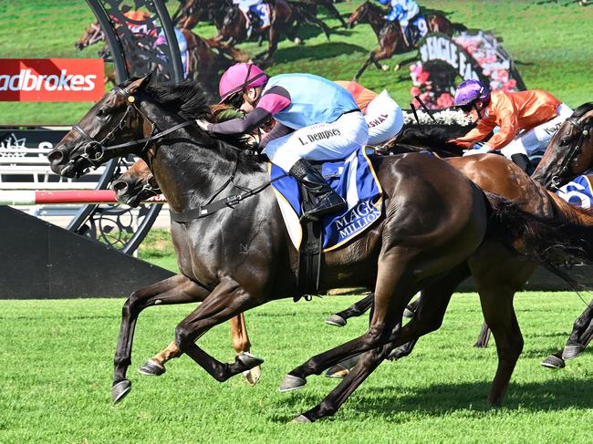 Luke Dempsey storms home aboard Give Me Space to win the Group 3 Vo Rogue Plate at Eagle Farm. Picture: Grant Peters - Trackside Photography.