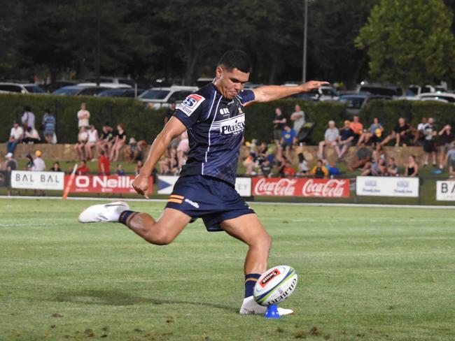 Noah Lolesio taking a kick for the Brumbies in their trial game against the Melbourne Rebels. Picture: Lachlan Lawson Photography 