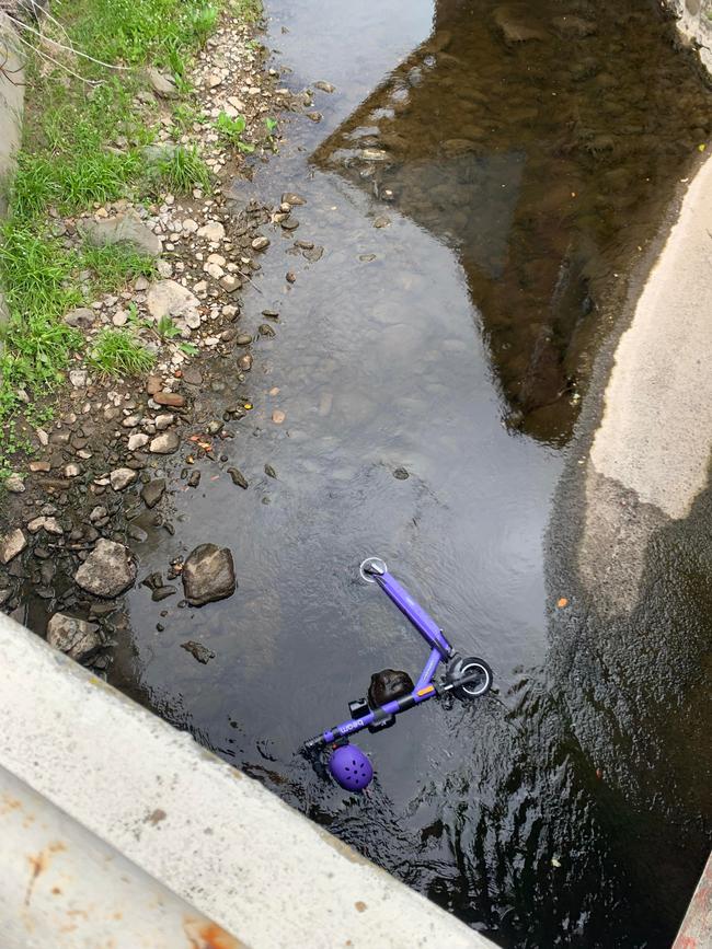 IN THE DRINK: A Beam e-scooter was found dumped in the Hobart Rivulet over the weekend. Picture: Supplied