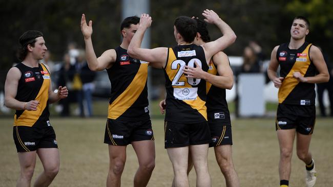 Johnathan Tomasiello celebrates goal for Heidelberg. Picture: Andrew Batsch