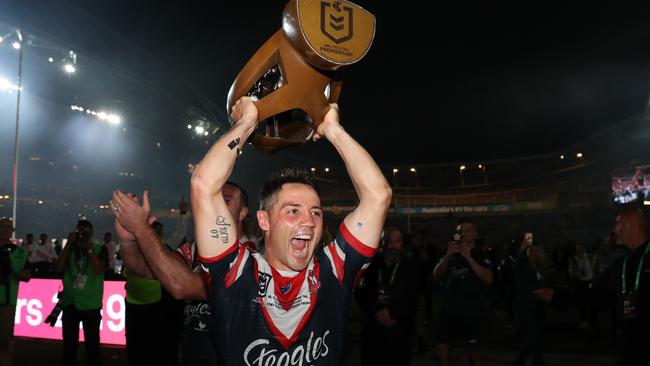 Cooper Cronk celebrates ending his NRL career with a grand final triumph. Picture: Brett Costello.