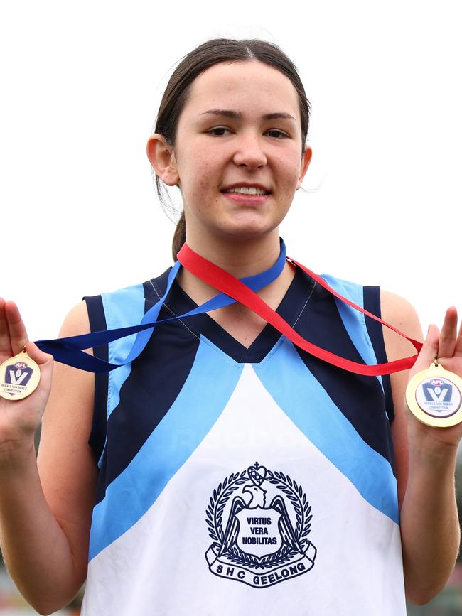 Dickson with her two medals. (Photo by Graham Denholm/AFL Photos via Getty Images)