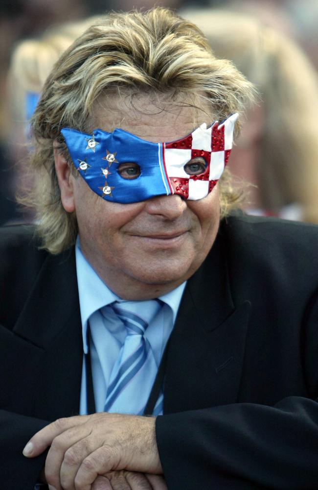 Masked SA tuna fisherman, racehorse owner Tony Santic before Makybe Diva won the 2005 Cox Plate.