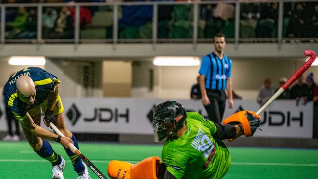 Jack Welch of Tasmania takes a shot at goal which was stopped by Johan Durst of Melbourne. Picture: Sam Volker / Solstice Digital