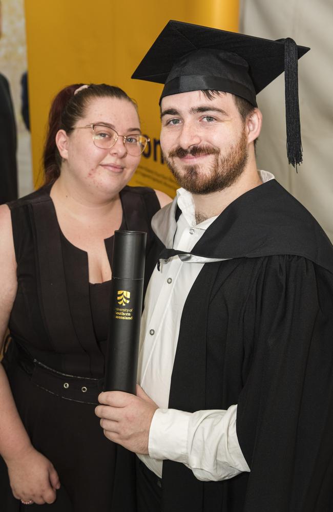 Bachelor of Business graduate Brandon Robinson with Jazmin Peasley at a UniSQ graduation ceremony at Empire Theatres, Wednesday, February 14, 2024. Picture: Kevin Farmer