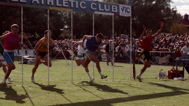 Dean Capobianco (far right) wins the 1990 Stawell Gift ahead of Tim Mason (2nd, blue) and Todd Ireland (3rd, pink).