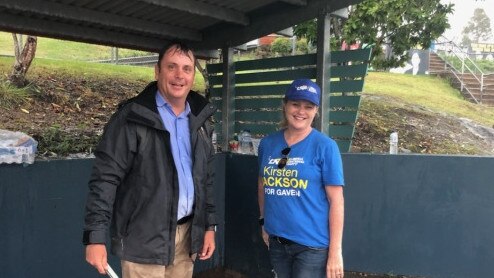 Theodore LNP MP Mark Boothman with a volunteer after storms hit the northern Gold Coast on election day 2020. Photo: Paul Weston