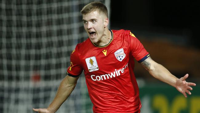 Riley McGree celebrates his late winner for Adelaide United in its FFA Cup semi-final win over Central Coast Mariners. Picture: AAP Image/Darren Pateman