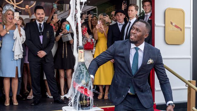 Usain Bolt in the G. H. Mumm marquee. Picture: Jake Nowakowski