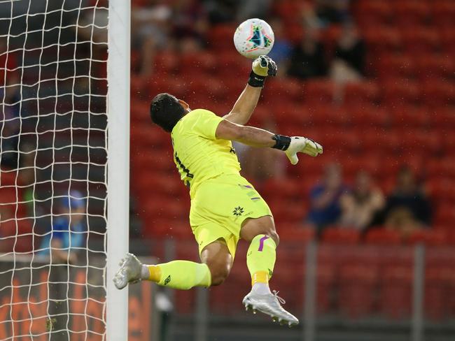 Roar goalkeeper Jamie Young makes a reaction save. Picture: Getty Images