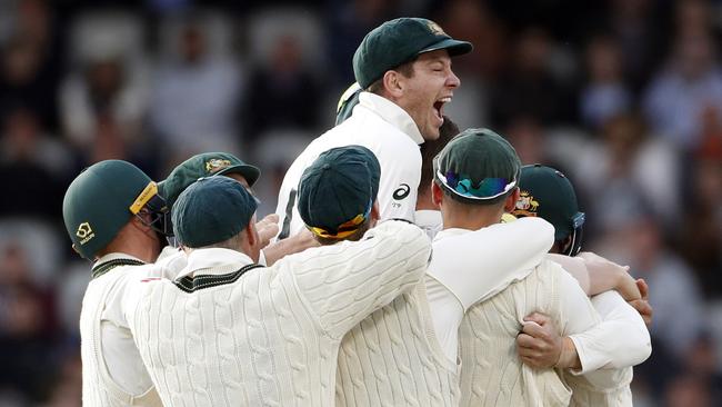 Tim Paine celebrates with his teammates after Australia's win in the fourth Test. Picture: AP