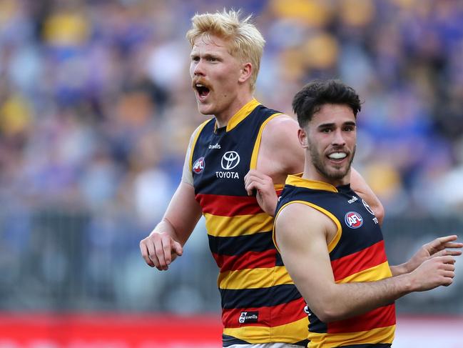 PERTH, AUSTRALIA - AUGUST 07: Elliott Himmelberg of the Crows celebrates after scoring a goal during the 2022 AFL Round 21 match between the West Coast Eagles and the Adelaide Crows at Optus Stadium on August 7, 2022 in Perth, Australia. (Photo by Will Russell/AFL Photos via Getty Images)