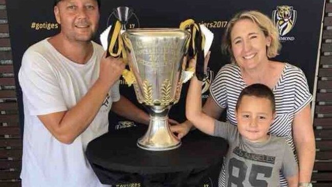 Kurtis with his dad, Troy, and mum, Sharni.