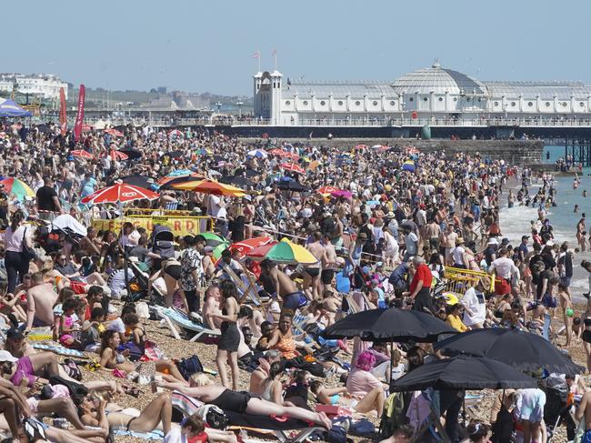 BRIGHTON, ENGLAND - MAY 31: Hardly an inch to spare on Brighton beach as thousands flock to the seaside to make the best of the Bank Holiday sunshine and celebrate the easing of lockdown on May 31, 2021 in Brighton, England. (Photo by Chris Eades/Getty Images)