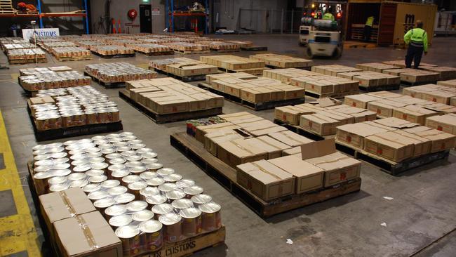 Tomato tins containing 15 million ecstasy pills that were imported to Melbourne.