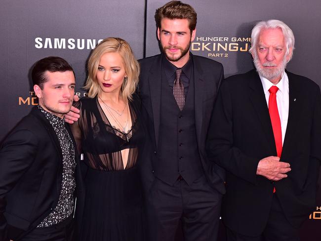 Josh Hutcherson, Jennifer Lawrence, Liam Hemsworth and Donald Sutherland attend the 'The Hunger Games: Mockingjay- Part 2' New York premiere in New York City in 2005. Picture: Getty Images