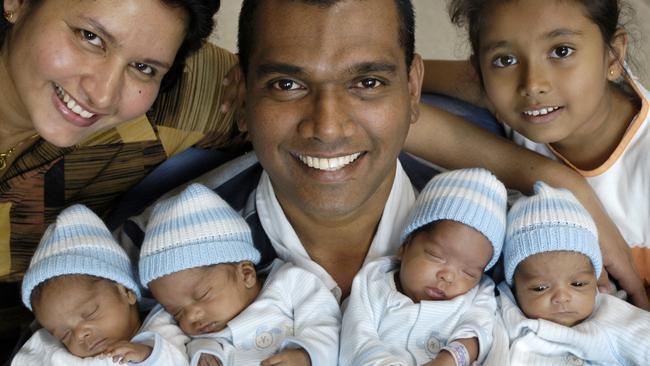 Veronica and Niroshan Ranaweera and big sister Vinuri with newborn quads L-R: Brian, Kevin, Dylan and Ryan.