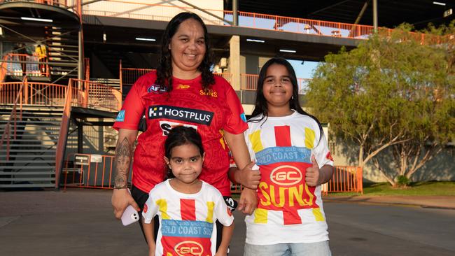 Cora Johnston, Janice McCarthy and Billindy Johnston at the 2024 AFL match between Gold Coast Suns and North Melbourne at TIO Stadium. Picture: Pema Tamang Pakhrin