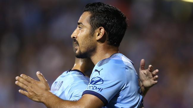 Sydney FC forward Reza Ghoochannejhad (right) celebrates with teammate Michael Zullo after scoring against Adelaide United on Friday night. Picture: Getty Images 