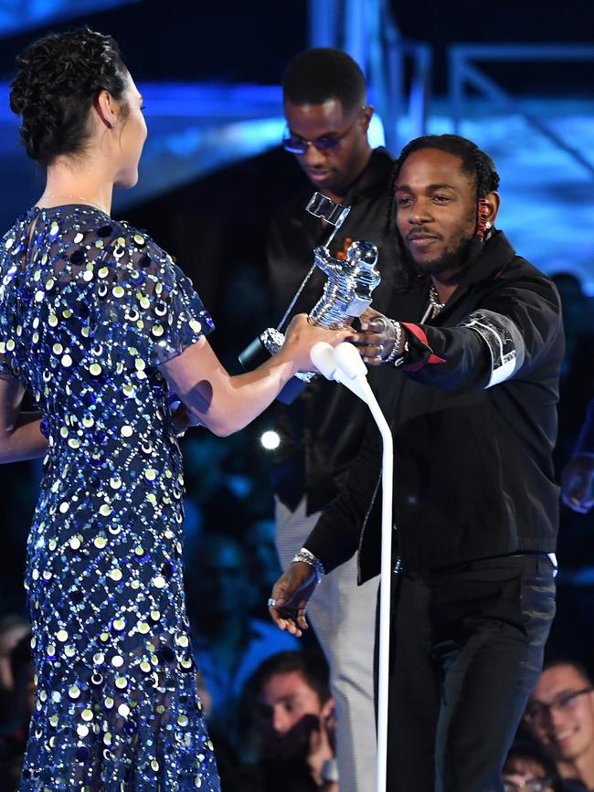 Kendrick Lamar and Dave Free accept the Video of the Year award for ‘Humble’ from Gal Gadot onstage during the 2017 MTV Video Music Awards at The Forum on August 27, 2017 in Inglewood, California. Picture: Getty
