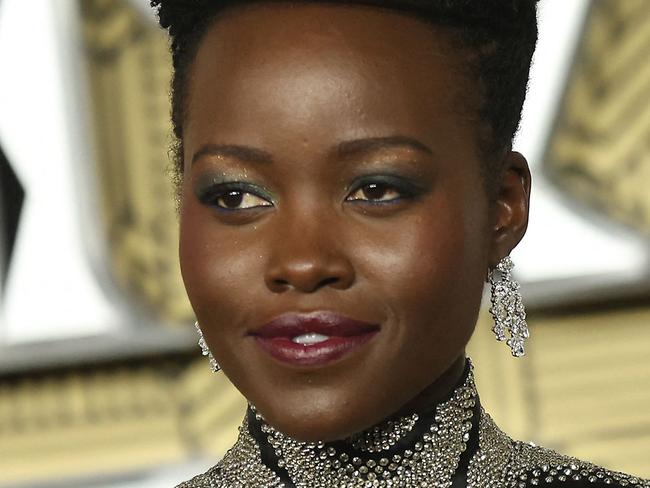 Mexico-born Kenyan actress Lupita Nyong'o poses on the red carpet on arrival to attend the European Premiere of "Black Panther: Wakanda Forever" in London, on November 3, 2022. (Photo by ISABEL INFANTES / AFP)